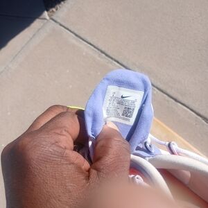 Nike Sneakers with Purple Accents